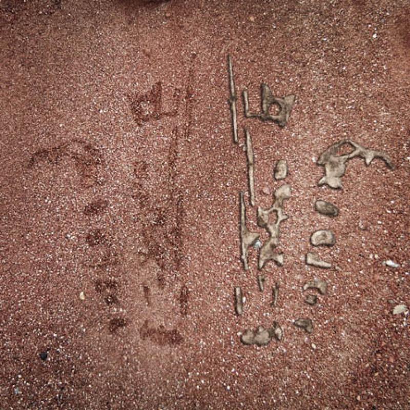 The drawings that Aboriginals sketch in the sand to communicate their oral histories exist for only moments. Here, the crudeness of those momentary drawings is captured with molten metal, where a drawing of a landscape of mining value is captured in new artefacts. 