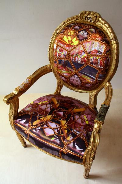 Re-upholstered chair with sexualised ornamental motifs and perspective drawings printed on silk.